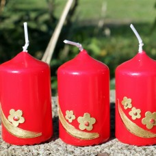 Rdeče adventne svečke za adventni venček