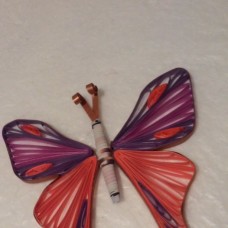 Oranžno vijoličast metulj