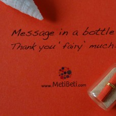 Stekleničke s sporočili MetiBeti